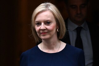 Britain"s Prime Minister Liz Truss walks out of Number 10 Downing Street on her way to the House of Commons for the government"s anti-inflation budget plan in London. Image: Daniel LEAL / AFP