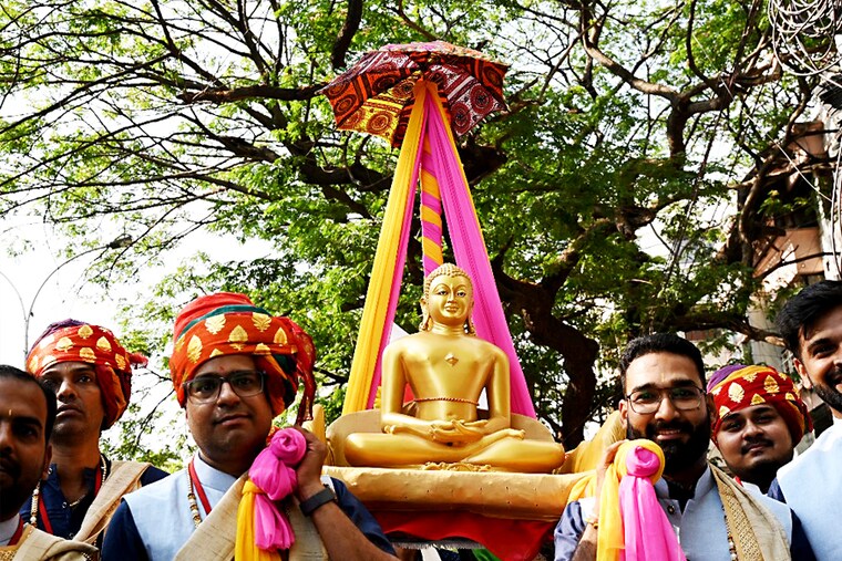 Devotees take part in a procession on the occasion of "Mahavir Jayanti" to commemorate the birth anniversary of Lord Mahavir, the founder of Jainism, in Chennai on April 4, 2023.