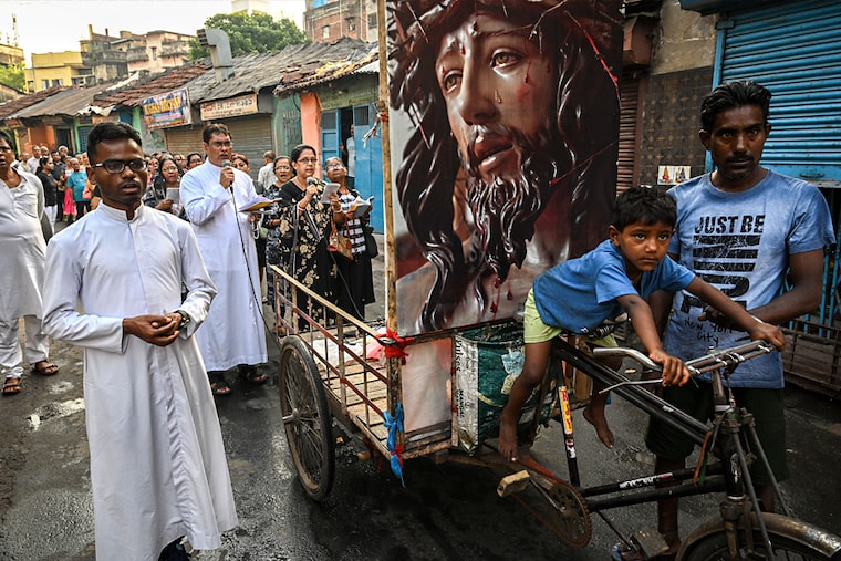Catholic devotees participate in a religious procession to mark Good Friday, in Kolkata on April 07, 2023. Image: Sankhadeep Banerjee/NurPhoto via Getty Images
