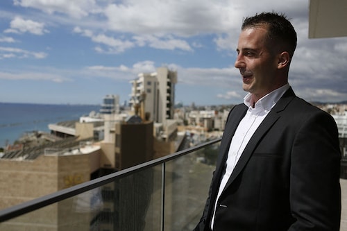 French real estate agent Florent Gastine standing on the balcony of an apartment in Limassol.
Image: Alex Mita / AFP French real estate agent Florent Gastine standing on the balcony of an apartment in Limassol.
Image: Alex Mita / AFP