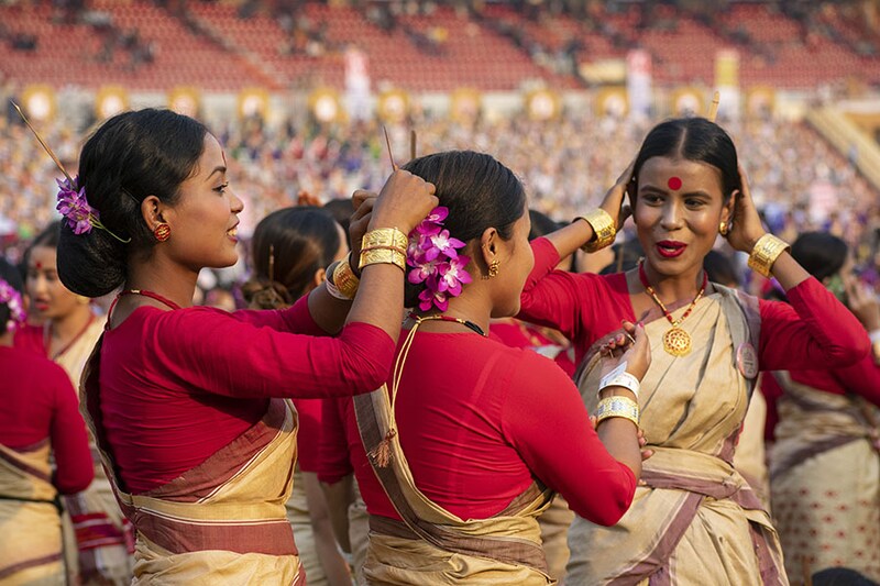 Bihu dancers arrive to perform the folk dance attempting to set a Guinness World Record during an event celebrating the Rongali Bihu festival, at Sarusajai Stadium, on April 13, 2023, in Guwahati, India. Over 11,000 Bihu dancers participated in the performance. Rongali Bihu or Bohag Bihu is one of the most significant and important festivals in Assam.