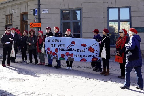 Birgitta Sevefjord (R), 79, chairwoman of the "Tantpatrullen" movement (Auntie Patrol), leads a demonstration for better pensions for women in the old town of Stockholm, Sweden, in front of the Swedish parliament, while the lettering on the banner reads "We demand a new pension system". - The protest of The Tantpatrullen against the Swedish pension system is entering its tenth year, in the name of better rights for women.
Image: Maelle Lions-Geollot / AFP) Birgitta Sevefjord (R), 79, chairwoman of the "Tantpatrullen" movement (Auntie Patrol), leads a demonstration for better pensions for women in the old town of Stockholm, Sweden, in front of the Swedish parliament, while the lettering on the banner reads "We demand a new pension system". - The protest of The Tantpatrullen against the Swedish pension system is entering its tenth year, in the name of better rights for women.
Image: Maelle Lions-Geollot / AFP)