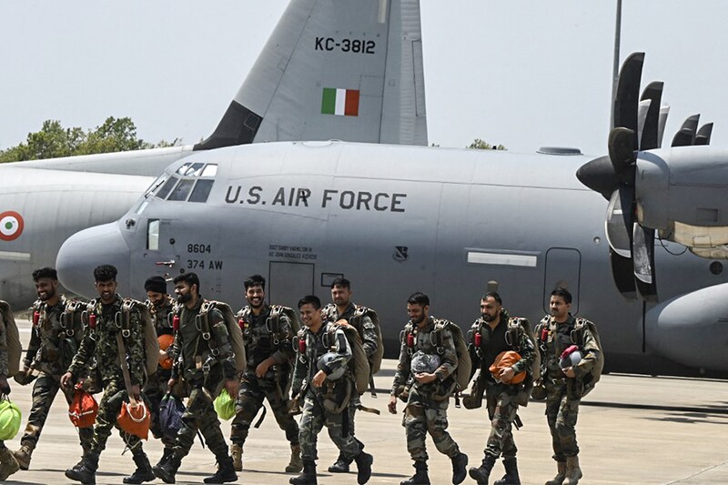 The Indian Air Force (IAF) personnel take part in a joint "Exercise Cope India 2023"—a bilateral air exercise between IAF and the United States Air Force (USAF)—at the Arjan Singh air force station in Panagarh, West Bengal on April 20, 2023.