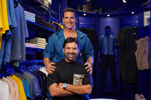 Actor Akshay Kumar and Maniish Mandhana (sitting) opened their first flagship store for an athleisure wear label, Force IX at Linking Road in Bandra, Mumbai, on April 26.