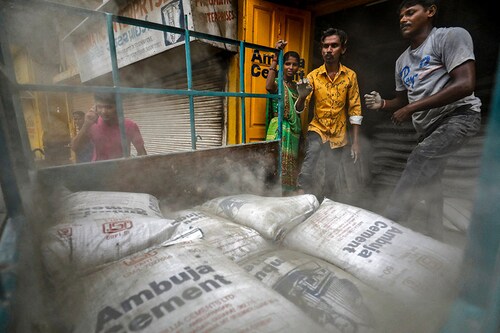 Ambuja Cement, part of the Adani Group, has added an additional 6 million tonnes in capacity with the acquisition of Sanghi Industries
Image: Reuters/Amit Dave/File Photo Ambuja Cement, part of the Adani Group, has added an additional 6 million tonnes in capacity with the acquisition of Sanghi Industries
Image: Reuters/Amit Dave/File Photo