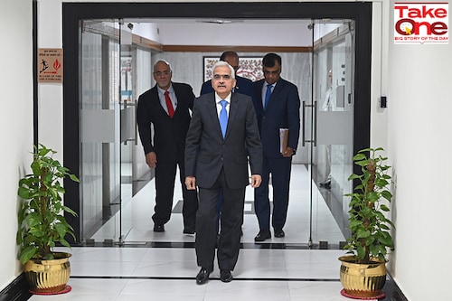 Reserve Bank of India (RBI) governor Shaktikanta Das (C) arrives along with deputy governors to address a press conference in Mumbai on August 10, 2023. - India"s central bank again left interest rates unchanged on August 10 but warned that higher food prices, caused in part by extreme weather, had impacted household budgets and halted a downward inflation trend. Image: Indranil Mukherjee / AFP