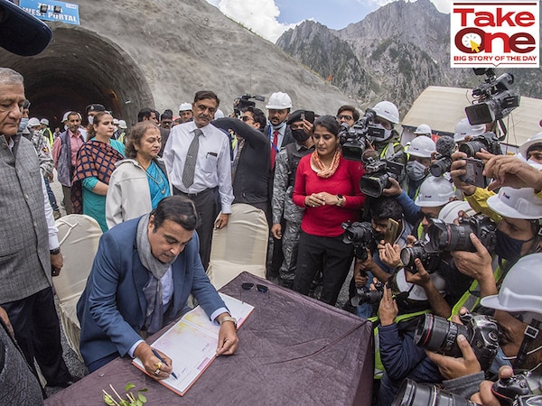 India"s Union Minister of Road Transport and Highways Nitin Gadkari, signs a register while inspecting the under construction Zojila tunnel which will connect Kashmir with Ladakh, on September 28, 2021 in Baltal 100 km east of Srinagar, Indian administered Kashmir, India. Image:  Yawar Nazir/Getty Images