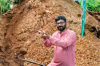Buyofuel CEO, Kishan Karunakaran at a wood chips factory in Perumbavoor, Kerala <br>Image: Arun Chandrabose for Forbes India