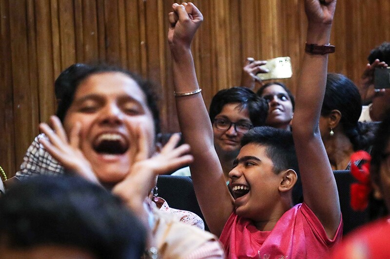 Families gathered at a hall to watch the livestream of Chandrayaan-3 spacecraft"s much awaited touchdown on the moon"s unchartered south pole, erupt into cheer as they celebrate the perfect soft landing of the spacecraft, Mumbai, India, 23 August, 2023.