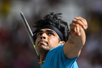 India"s Neeraj Chopra competes in the men"s javelin throw qualification for group A during the World Athletics Championships at the National Athletics Centre in Budapest, Hungary on August 25, 2023. With a superb first throw of 88.77m, Neeraj entered the championships finals and qualified for 2024 Olympics.