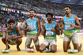 Rajesh Ramesh, Muhammed Ajmal Variyathodi, Amoj Jacob, and Muhammed Anas Yahiya of Team India pose for a photo after the Men"s 4x400m Relay Heats at the World Athletics Championships in Budapest, Hungary on August 26, 2023. The relay team made history, finishing second with an Asian record time of 2:59:05, qualifying for the final.