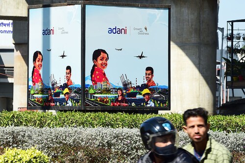 The Adani Group is in talks with Abu Dhabi Investment Authority  (ADIA) and International Holding Company (IHC) for an investment of $2 billion by selling stakes in its subsidiaries.
Image: Sam Panthaky / AFP