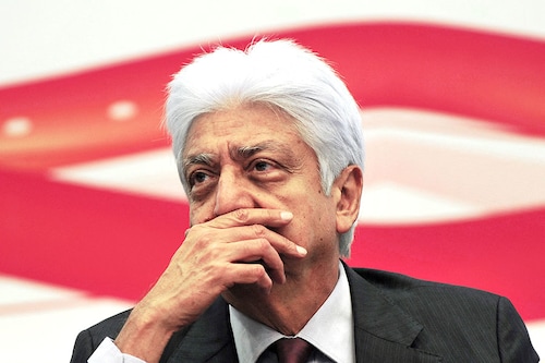 (File photo)Chairman of Wipro Limited, Azim Premji gestures during a press conference to announce the company"s financial results for the fourth quarter of the year 2011-12 at Wipro"s facility in Bangalore on April 25, 2012. Image: Manjunath Kiran / AFP (File photo)Chairman of Wipro Limited, Azim Premji gestures during a press conference to announce the company"s financial results for the fourth quarter of the year 2011-12 at Wipro"s facility in Bangalore on April 25, 2012. Image: Manjunath Kiran / AFP