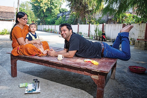 Shailesh Kumar, founder &amp CEO, CABT Logistics, with his mother in the courtyard of the house he was born in, in Morwa Raytol in Samastipur district, Bihar
Image: Madhu Kapparath