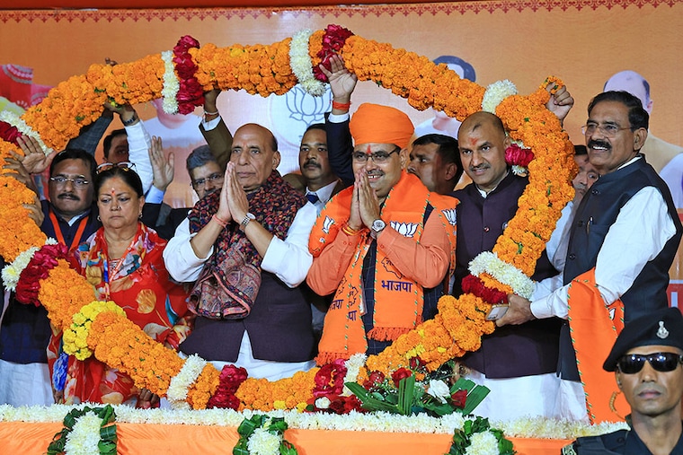 Defense Minister and BJP central observer for Rajasthan, Rajnath Singh, along with Rajasthan BJP President CP Joshi, former Rajasthan Chief Minister Vasundhara Raje, and newly-elected Rajasthan Chief Minister Bhajan Lal Sharma, being garlanded after the BJP Legislature Party meeting in Jaipur, Rajasthan, India, on December 12, 2023.