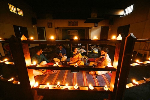 Carnatic musicians sing devotional hymns during a concert at a temple in Chennai, on December 17, 2023, to mark the beginning of the auspicious month of Margazhi. The month signifies a harmonious blend of devotion and music, starting with concerts in the famed sabhas in Chennai.