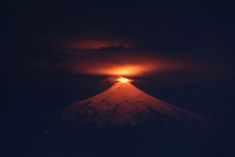 The Villarrica volcano as seen at night from Villarrica town, Chile, on December 20, 2023.