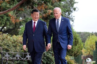 US President Joe Biden (R) and Chinese President Xi Jinping walk together after a meeting during the Asia-Pacific Economic Cooperation (APEC) Leaders" week in Woodside, California on November 15, 2023. Image: Brendan Smialowski / AFP