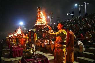 Priests perform evening prayers on the banks of river Sarayu at Ayodhya, believed to be the birthplace of Ram, one of the most worshipped deities in the Hindu pantheon, in India"s Uttar Pradesh state on December 27, 2023.