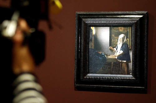 In his lifetime, during the "Golden Age" of Dutch art that also produced Rembrandt, Vermeer was a respected artist with a number of wealthy patrons, but apart from a few astute collectors, his work went largely forgotten after his death. Image: Francois Guillot / AFPÂ©