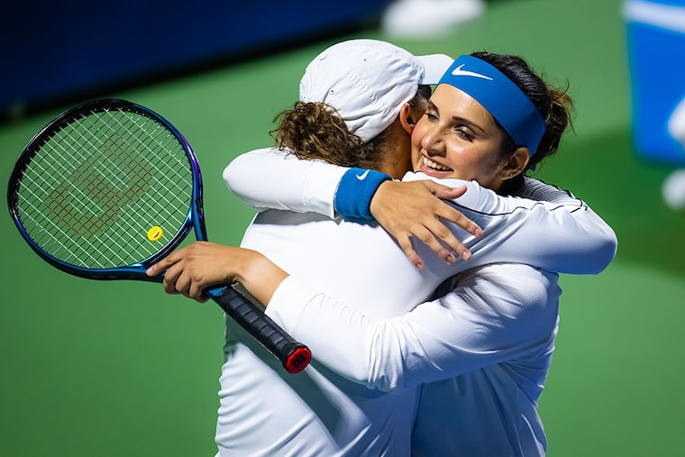 Sania Mirza hugs partner Madison Keys of the United States after finishing her last-ever career match on Day 3 of the Dubai Duty Free Tennis at Dubai Duty Free Tennis Stadium on February 21, 2023, in Dubai, United Arab Emirates