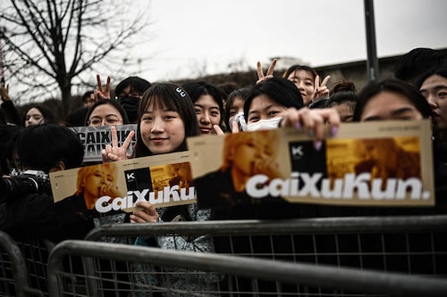 Fans of Chinese singer-songwriter, dancer and rapper Cai Xukun, a.k.a. Kun, wait for his arrival outside the Prada show.
Image: Marco Bertorello / AFP© Fans of Chinese singer-songwriter, dancer and rapper Cai Xukun, a.k.a. Kun, wait for his arrival outside the Prada show.
Image: Marco Bertorello / AFP©