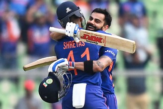 Virat Kohli is congratulated by his teammate Shreyas Iyer after he scored a century during the third and final one-day international cricket match between India and Sri Lanka at the Greenfield International Stadium in Thiruvananthapuram on January 15, 2023. India won the series and the third ODI match by 317 runs.