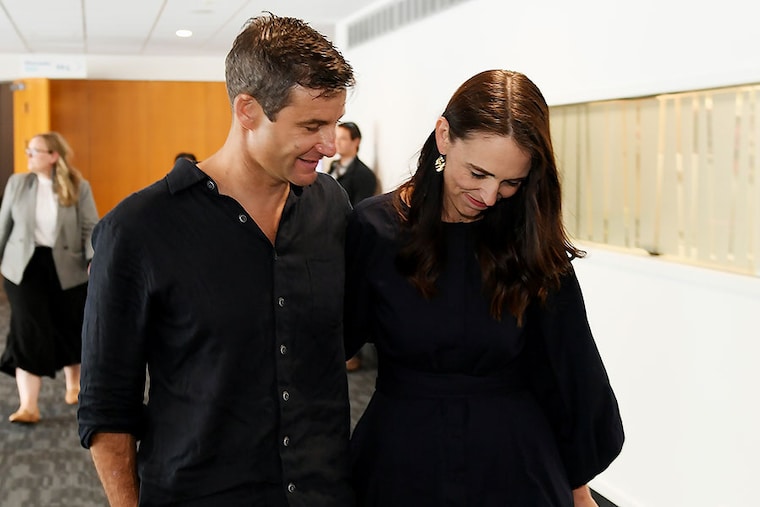 New Zealand Prime Minister Jacinda Ardern and partner Clarke Gayford leave after she announces her resignation at the War Memorial Centre on January 19, 2023 in Napier, New Zealand.