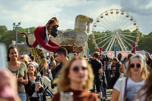 A showman manoeuvre an oversized figure in the form of a gorilla through the crowd at the Lollapalooza Festival in the Berlin Olympic Park Photo by Gregor Fischer/picture alliance via Getty Images A showman manoeuvre an oversized figure in the form of a gorilla through the crowd at the Lollapalooza Festival in the Berlin Olympic Park Photo by Gregor Fischer/picture alliance via Getty Images