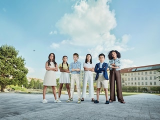 A showman manoeuvre an oversized figure in the form of a gorilla through the crowd at the Lollapalooza Festival in the Berlin Olympic Park Photo by Gregor Fischer/picture alliance via Getty Images