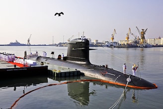 Indian Navy officers stand on INS Vagir, the fifth diesel-electric attack submarine of Project 75, during its commissioning ceremony at the Naval Dockyard in Mumbai, on January 23, 2023. Project 75 includes the indigenous construction of six submarines based on the Scorpene class developed by the French defence major, Naval Group (formerly DCNS), and the Spanish state-owned entity Navantia. These submarines are being constructed at Mazagon Dock Shipbuilders Limited Mumbai, in collaboration with Naval Group.