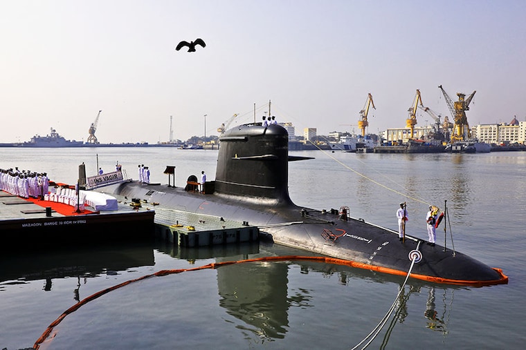 Indian Navy officers stand on INS Vagir, the fifth diesel-electric attack submarine of Project 75, during its commissioning ceremony at the Naval Dockyard in Mumbai, on January 23, 2023. Project 75 includes the indigenous construction of six submarines based on the Scorpene class developed by the French defence major, Naval Group (formerly DCNS), and the Spanish state-owned entity Navantia. These submarines are being constructed at Mazagon Dock Shipbuilders Limited Mumbai, in collaboration with Naval Group.