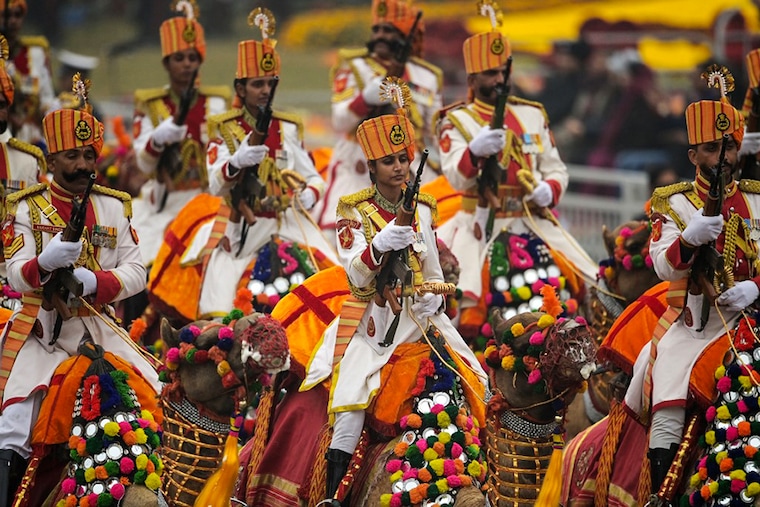 The Border Security Force (BSF) camel contingent march during India"s 74th Republic Day parade in New Delhi on January 26, 2023. 12 women hailing from Gujarat, Maharashtra, Rajasthan, Uttar Pradesh and Madhya Pradesh, from BSF"s "Mahila Prahari" squad, were chosen for the parade.