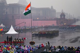 Marching bands from the Indian Army, Navy, and Air Force performing live in heavy rains during the Beating the Retreat ceremony, at Vijay Chowk on January 29, 2023, in New Delhi, India. The four-day-long Republic Day celebrations culminate with the Beating the Retreat ceremony which marks the return of the Army to the barracks.