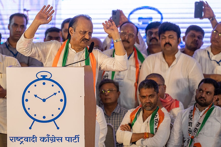 Maharashtra Deputy Chief Minister and NCP leader Ajit Pawar during the party meeting at MET Bandra on July 5, 2023, in Mumbai, India. Nationalist Congress Party relives history just a year after Shiv Sena did it for the first time. This time, Ajit Pawar is asking for a seat at the table, a change in leadership, and staking a claim to the party founded by his uncle Sharad Pawar. 83-year-old veteran, on the other hand, is once again taking to the streets to rejuvenate his party. Voters in Maharashtra are watching haplessly.