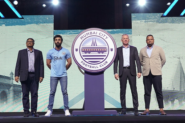 COO of City Football Group Roel de Vries (second from right), along with Mumbai City co-owners Bimal Parekh (extreme left) and Ranbir Kapoor (second from left), and CEO Kandarp Chandra (right) unveil  Mumbai City"s new crest in Mumbai on Friday. Image: Mumbai City FC