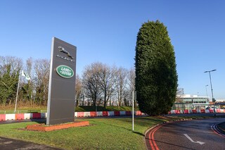 (File photo) A totem displaying company logos at the entrance to Tata Motors Ltd."s Jaguar Land Rover vehicle manufacturing plant in Solihull, UK, on Friday, January 20, 2023. Image: Chris Ratcliffe/Bloomberg via Getty Images