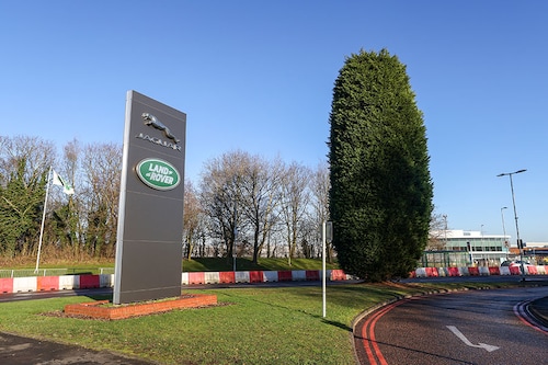 (File photo) A totem displaying company logos at the entrance to Tata Motors Ltd."s Jaguar Land Rover vehicle manufacturing plant in Solihull, UK, on Friday, January 20, 2023. Image: Chris Ratcliffe/Bloomberg via Getty Images (File photo) A totem displaying company logos at the entrance to Tata Motors Ltd."s Jaguar Land Rover vehicle manufacturing plant in Solihull, UK, on Friday, January 20, 2023. Image: Chris Ratcliffe/Bloomberg via Getty Images