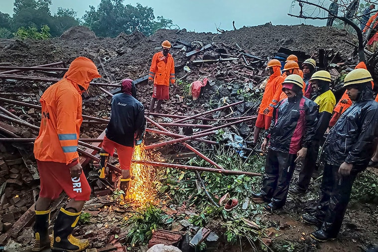 NDRF personnel during a search and rescue operation after a landslide at Irshalwadi village in Raigad district, Thursday, July 20, 2023. At least 10 people were killed in the incident, according to officials.