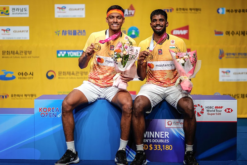 Winners Satwiksairaj Rankireddy and Chirag Shetty of India celebrate with gold medals after winning the Men"s Doubles Final match against Fajar Alfian and Muhammad Rian Ardianto of Indonesia on day 6 of 2023 Korea Open at Jinnam Stadium on July 23, 2023, in Yeosu, South Korea.