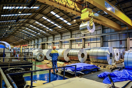 Steel worker uses a crane to handle rolls of steel at Tata Steel"s Wednesbury site in Willenhall, Wolverhampton.
Image: Ben Birchall/PA Images via Getty Images Steel worker uses a crane to handle rolls of steel at Tata Steel"s Wednesbury site in Willenhall, Wolverhampton.
Image: Ben Birchall/PA Images via Getty Images