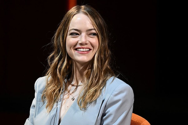 Emma Stone"s movie "Poor Things" will premier at Venice Film Festival, but the actor is not likely to appear for the release. Image: Aris MESSINIS / AFP