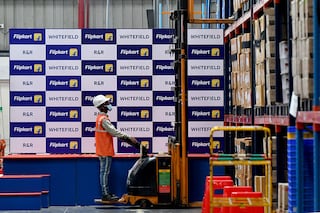 (File photo) A worker at Flipkart stores items inside its fulfilment centre on the outskirts of Bengaluru, India, September 23, 2021. Image: REUTERS/Samuel Rajkumar