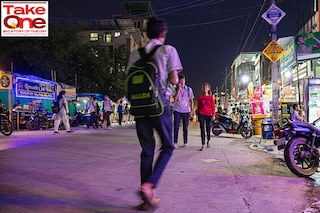 It"s a long day: A student going back to his hostel after finishing the last class of the day