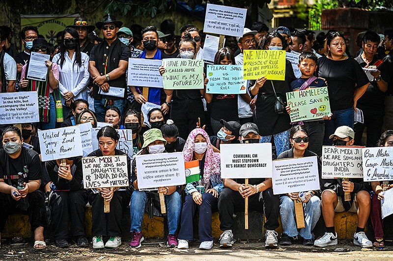 The tribal people of Manipur participate in a "Tribal Solidarity protest" against the ongoing tension in the state, at Jantar Mantar on May 31, 2023, in New Delhi, India. Amid fresh violence in Manipur in the ongoing clashes between the Meitei and Kuki-Zomi people, around 500 people from Manipur in Delhi NCR on Wednesday staged a demonstration at Jantar Mantar, demanding that President"s Rule (Article 356 of the Constitution) be imposed in the State as an immediate measure to control the violence.