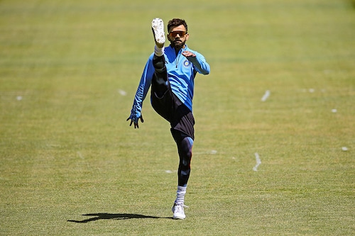 Virat Kohli warms up during India"s training session ahead of the ICC World Test Championship Final 2023 at Arundel Cricket Club on June 01, 2023, in Arundel, England.
