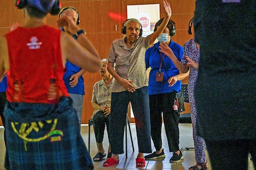 Research has shown music therapy can be helpful for people with certain conditions such as Alzheimer"s disease, the most common type of dementia, which begins with memory loss and can lead to difficulty with conversation and cognition.
Image: Roslan Rahman / AFPÂ©