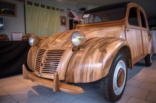 A Citroen 2CV made of wood, thought to be the only one of its kind, has sold for 210,000 euros ($225,000) at auction in France, setting a new price record for the iconic vehicle.
Image: Guillaume Souvant / AFP© A Citroen 2CV made of wood, thought to be the only one of its kind, has sold for 210,000 euros ($225,000) at auction in France, setting a new price record for the iconic vehicle.
Image: Guillaume Souvant / AFP©