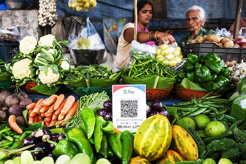 A rise in cashless payments and UPI has been cited as one of the reasons for the increase in the GDP rate. Image: Ashish Vaishnav/SOPA Images/LightRocket via Getty Images