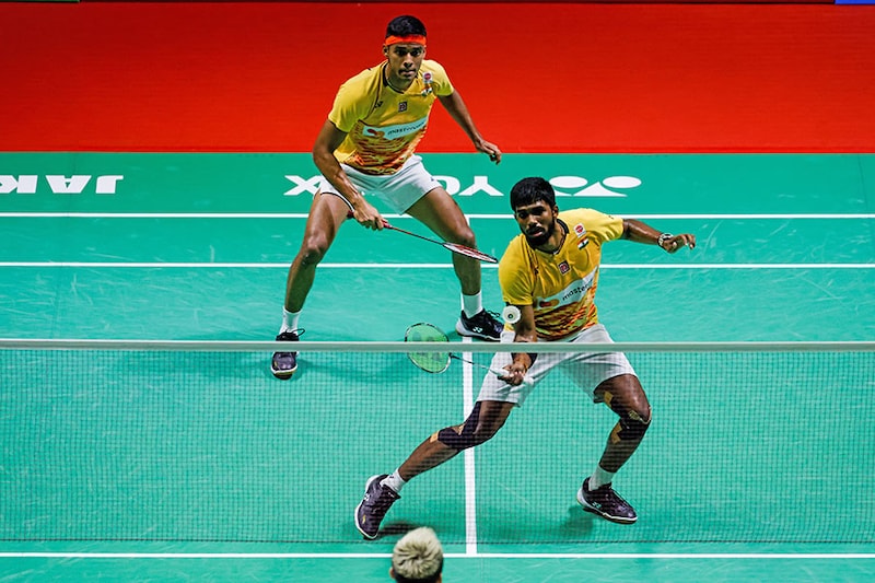 India"s dynamic badminton pair Satwiksairaj Rankireddy (R) and Chirag Shetty of India made history by defeating second seeded Aaron Chia and Soh Wooi Yik of Malaysia 21-17, 21-18 to claim the Indonesia Open 2023, India"s first ever BWF Super 1000 World Tour title on June 18, 2023, in Jakarta, Indonesia.